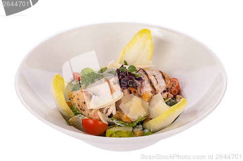 Image of tasty fresh caesar salad with grilled chicken and parmesan 