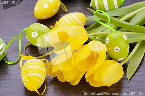 Image of Colourful yellow and green spring Easter Eggs