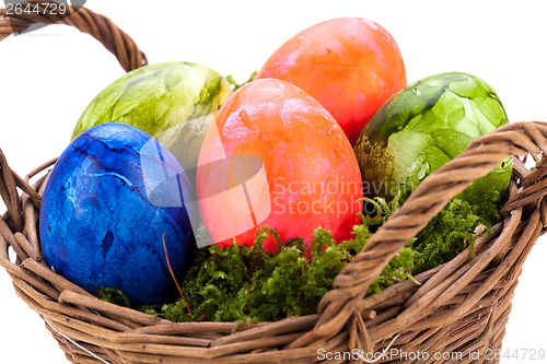 Image of Basket of brightly coloured Easter Eggs