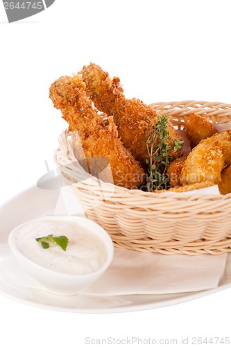 Image of Crisp crunchy golden chicken legs and wings