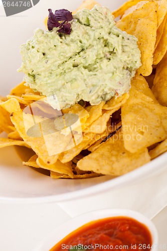 Image of Crisp corn nachos with guacamole sauce