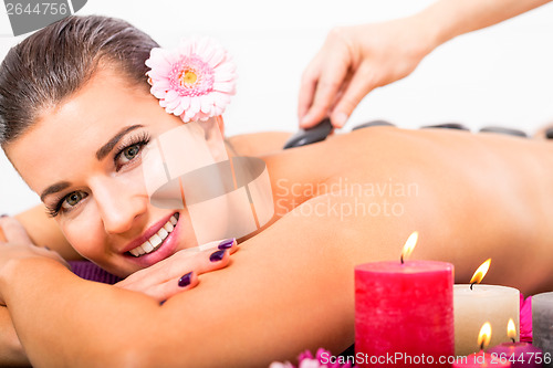 Image of Beautiful woman having a back massage