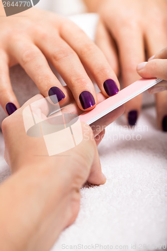 Image of manicure making in beauty spa salon