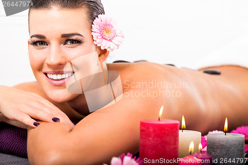 Image of Beautiful woman having a back massage