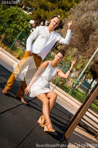 Image of Elegant trendy young couple