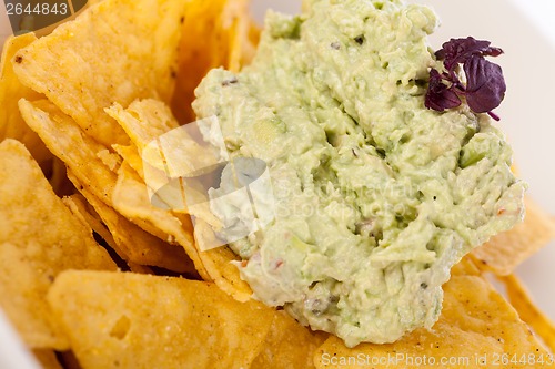 Image of Crisp corn nachos with guacamole sauce