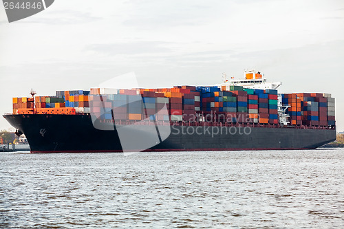 Image of Fully laden container ship in port