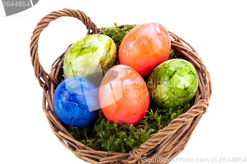 Image of Basket of brightly coloured Easter Eggs