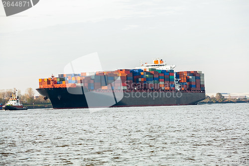 Image of Fully laden container ship in port