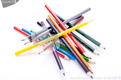 Image of Bunch of colourful pencil crayons on white