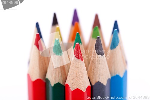 Image of Bunch of colourful pencil crayons on white