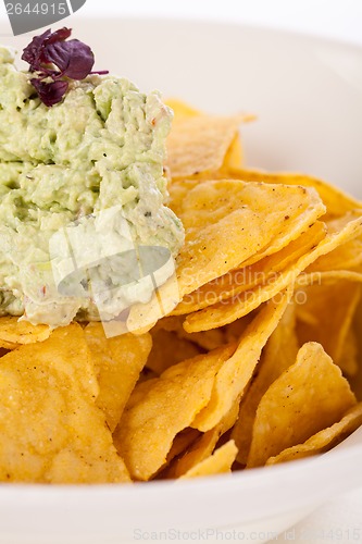 Image of Crisp corn nachos with guacamole sauce