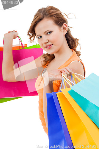 Image of Happy attractive young shopaholic