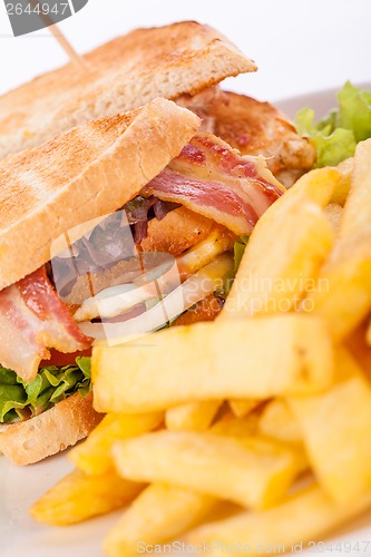 Image of Club sandwich with potato French fries