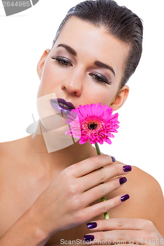 Image of Beautiful woman in purple make-up