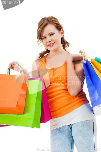 Image of Happy attractive young shopaholic