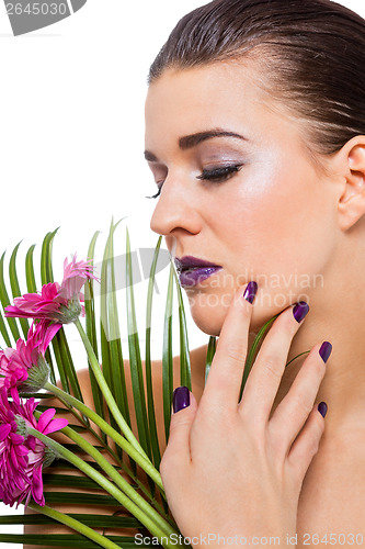 Image of Beautiful woman in purple make-up