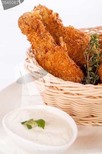 Image of Crisp crunchy golden chicken legs and wings