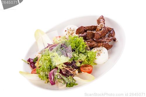 Image of grilled beef stripes fresh salad and goat cheese
