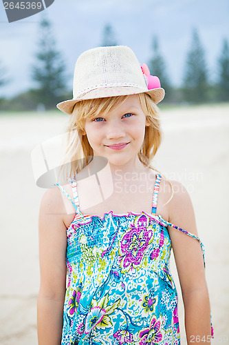 Image of Cute young girl at beach