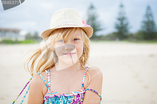 Image of Cute young girl at beach