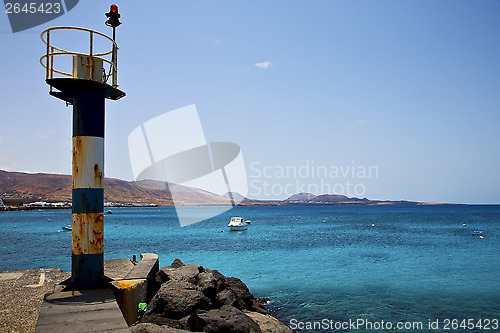 Image of lighthouse and pier  arrecife teguise lanzarote spain