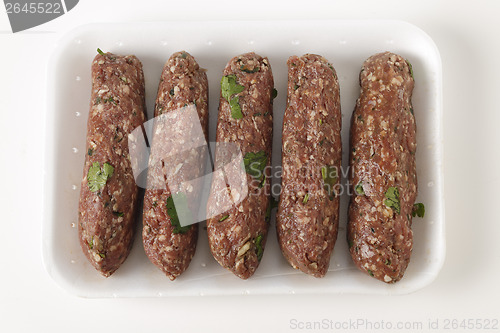 Image of Raw lamb kofta in a tray