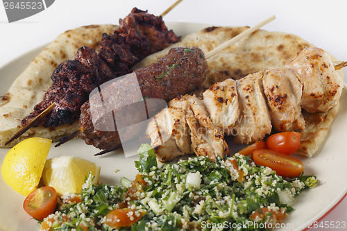 Image of Arab style barbecue meal with tabouleh