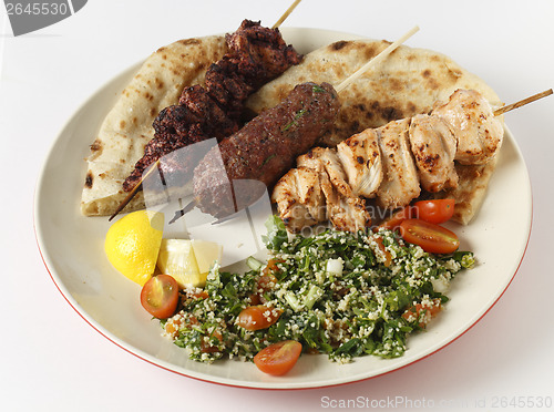 Image of Barbecue kebab plate with tabouleh