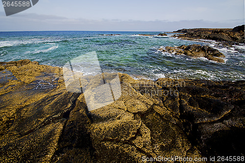 Image of spain sky cloud   coastline and summer in lanzarote 