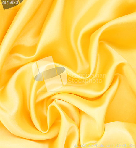 Image of Smooth elegant golden silk as background 