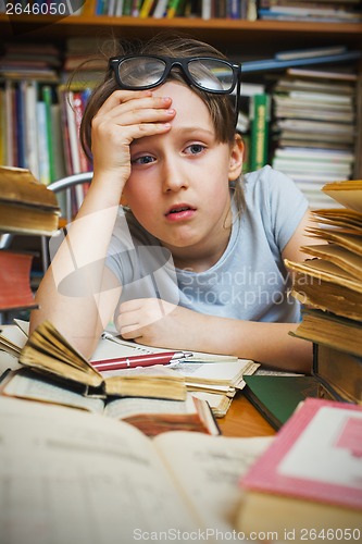 Image of Girl tired of learning lessons