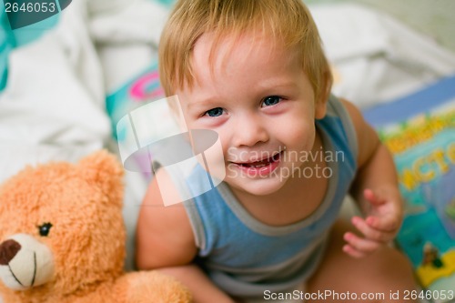 Image of boy with bear