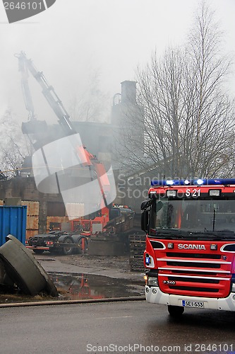 Image of Extinguishing Smoldering Industrial Fire