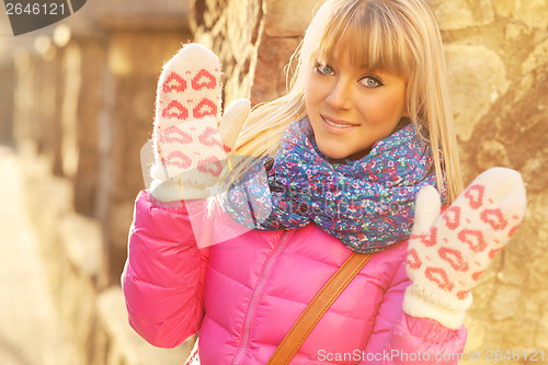 Image of Beautiful young  woman on a winter walk