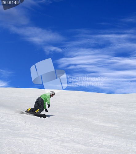 Image of Snowboarder on ski slope