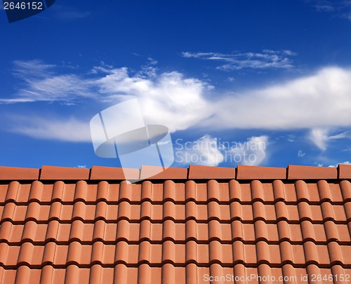 Image of Roof tiles and sky with clouds