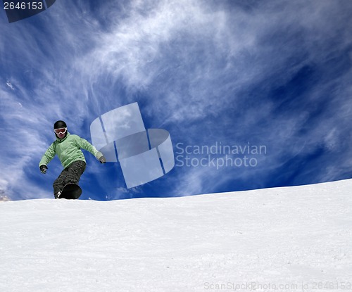 Image of Snowboarder on off-piste slope