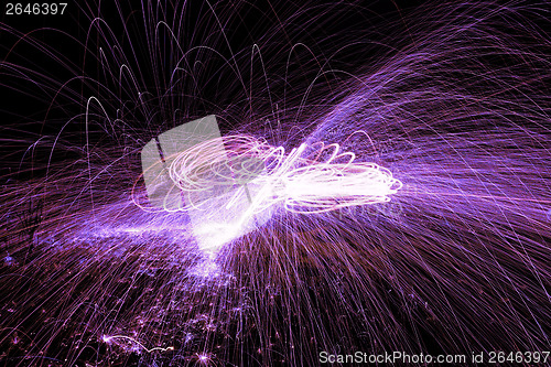 Image of Showers of hot glowing sparks