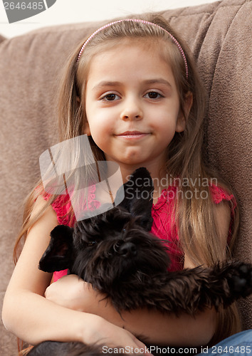 Image of Girl with puppy