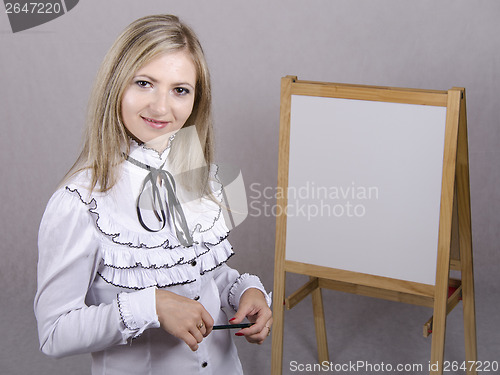 Image of Working girl holds presentation