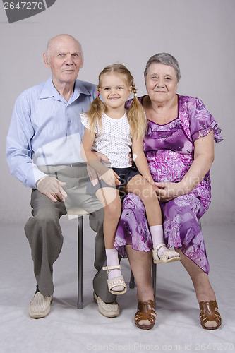 Image of Group portrait: grandmother, grandfather and granddaughter