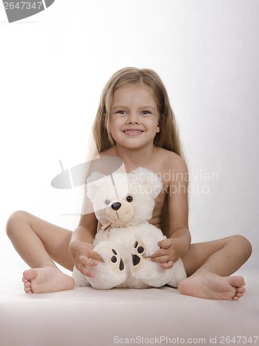 Image of Four-year-old girl bear hug