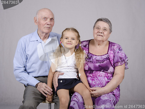 Image of Group portrait: grandmother, grandfather and granddaughter