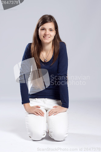 Image of Young long-haired woman with natural beauty