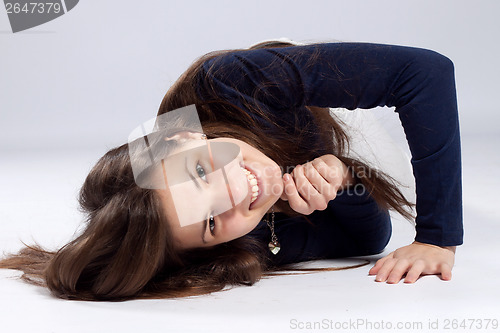 Image of Young long-haired woman with natural beauty