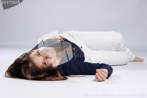 Image of Young long-haired woman with natural beauty