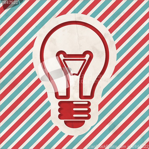 Image of Light Bulb Icon on Striped Background.