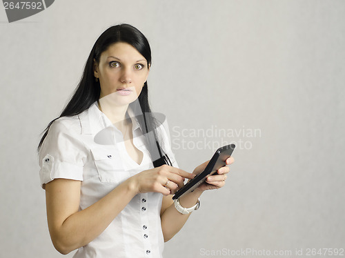 Image of girl is very upset by counting on the calculator