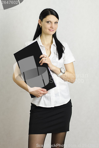 Image of Business girl with a laptop